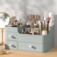 Green three-drawer storage box